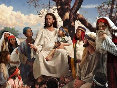 Jesus com as crianças no colo.